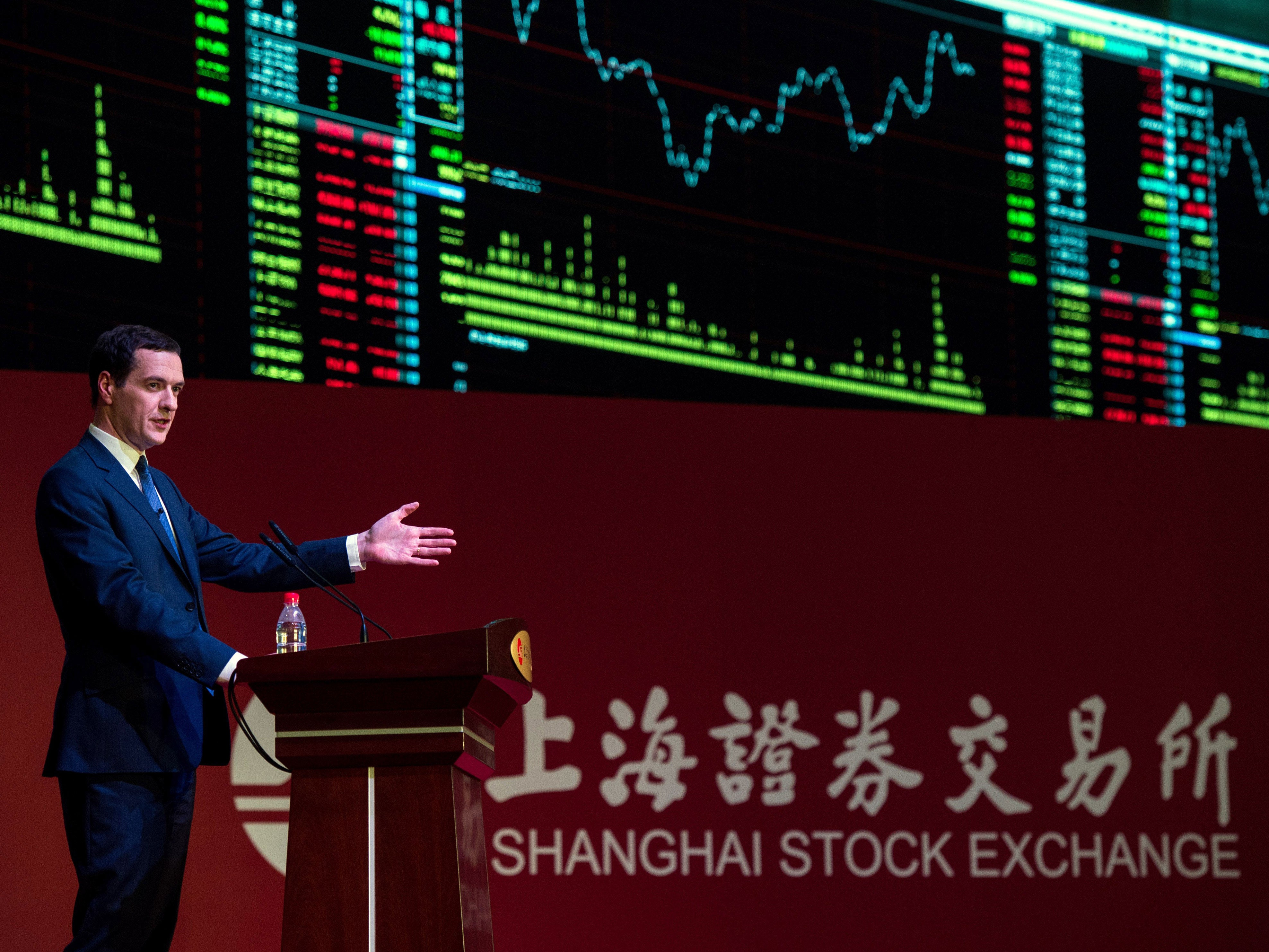 Britain's Chancellor of the Exchequer George Osborne delivers a speech at the Shanghai Stock Exchange in Shanghai on September 22, 2015. Osborne will urge closer business ties with China as he visits the country's commercial hub Shanghai on September 22,