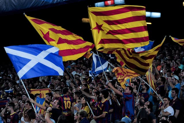 Barcelona fans could be seen flying saltires in support of Scottish independence last year
