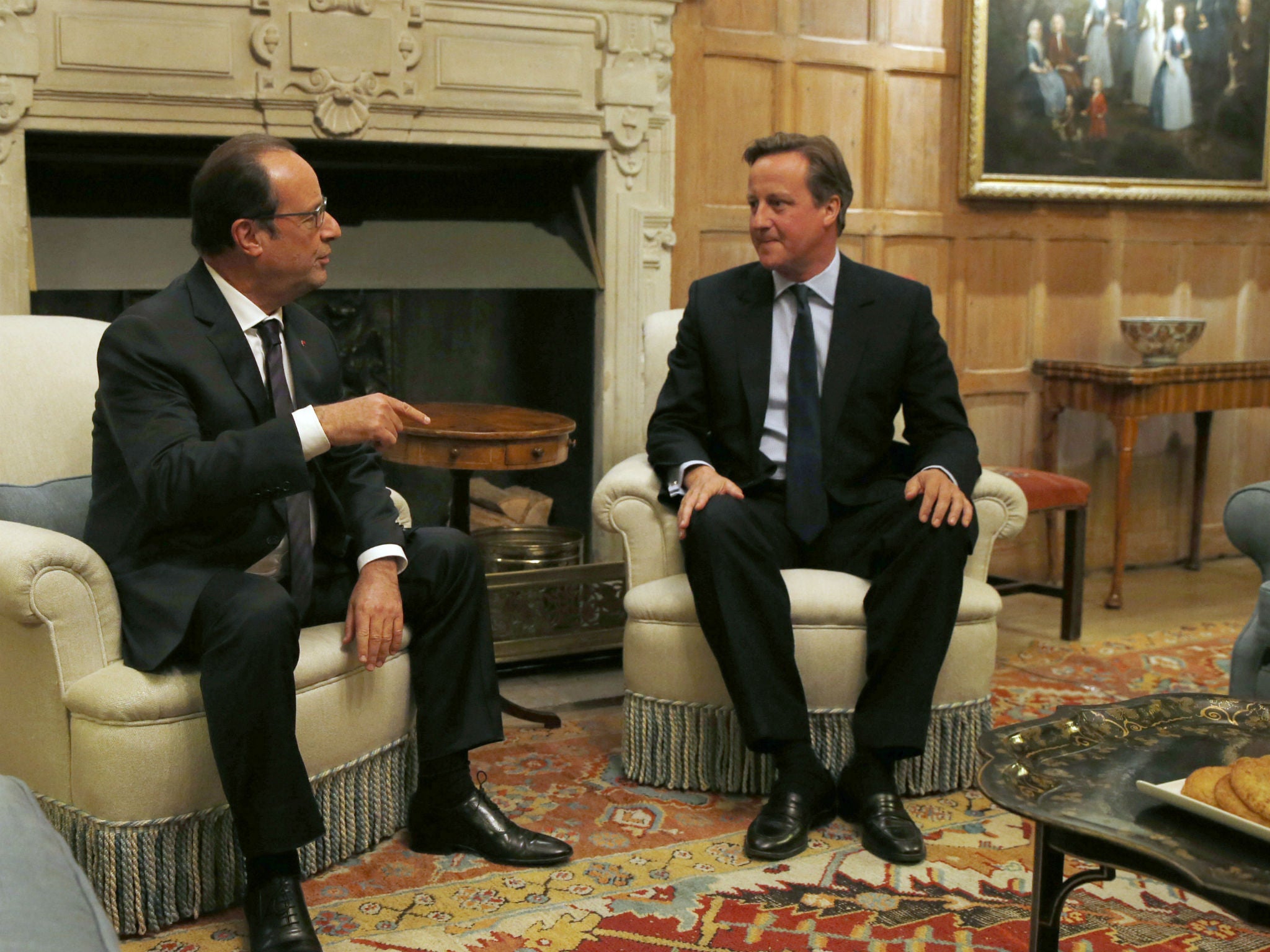 Speaking with French President Francois Hollande, David Cameron said more action was needed to help those with a genuine claim to asylum from war-torn countries