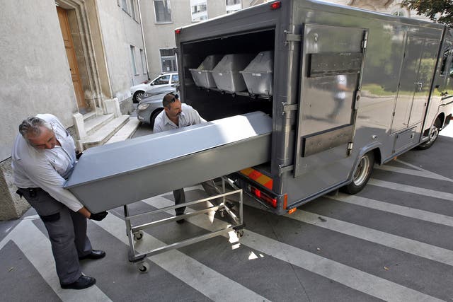 Coffins of the refugees who died in the back of a truck in Austria last month