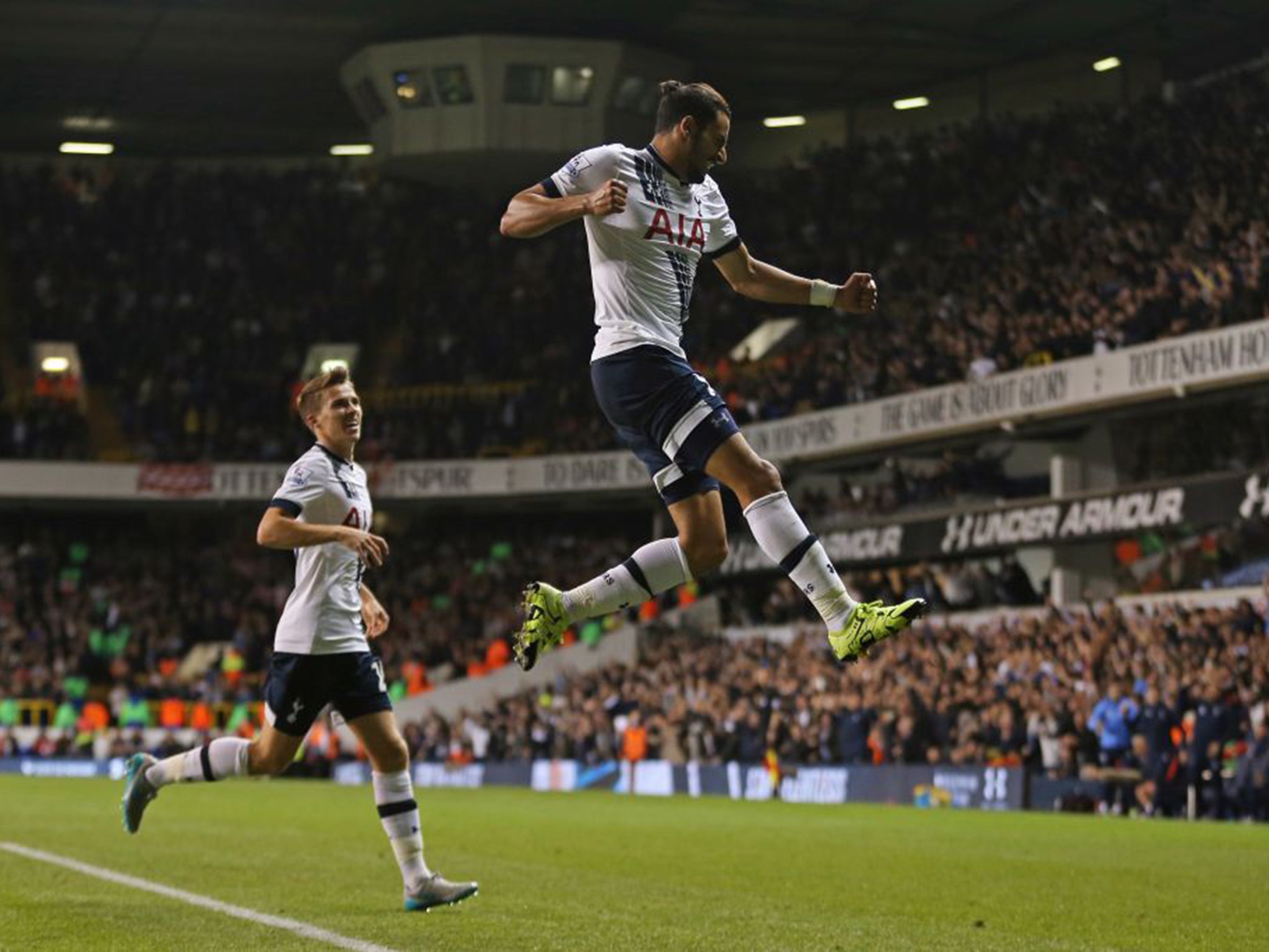 Nacer Chadli celebrates after Calum Chambers turned in his cross