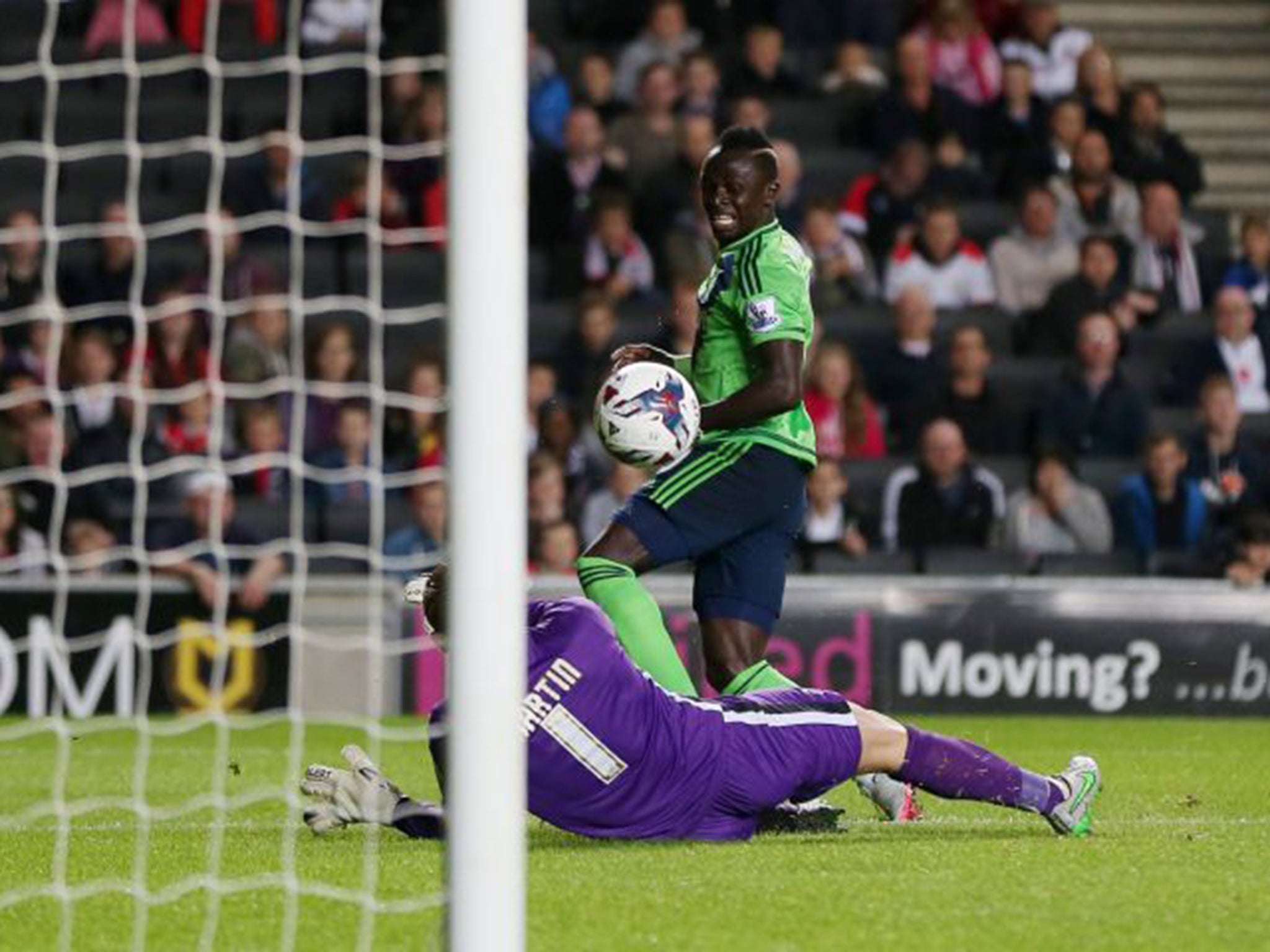 Sadio Mane scores the first of his two goals