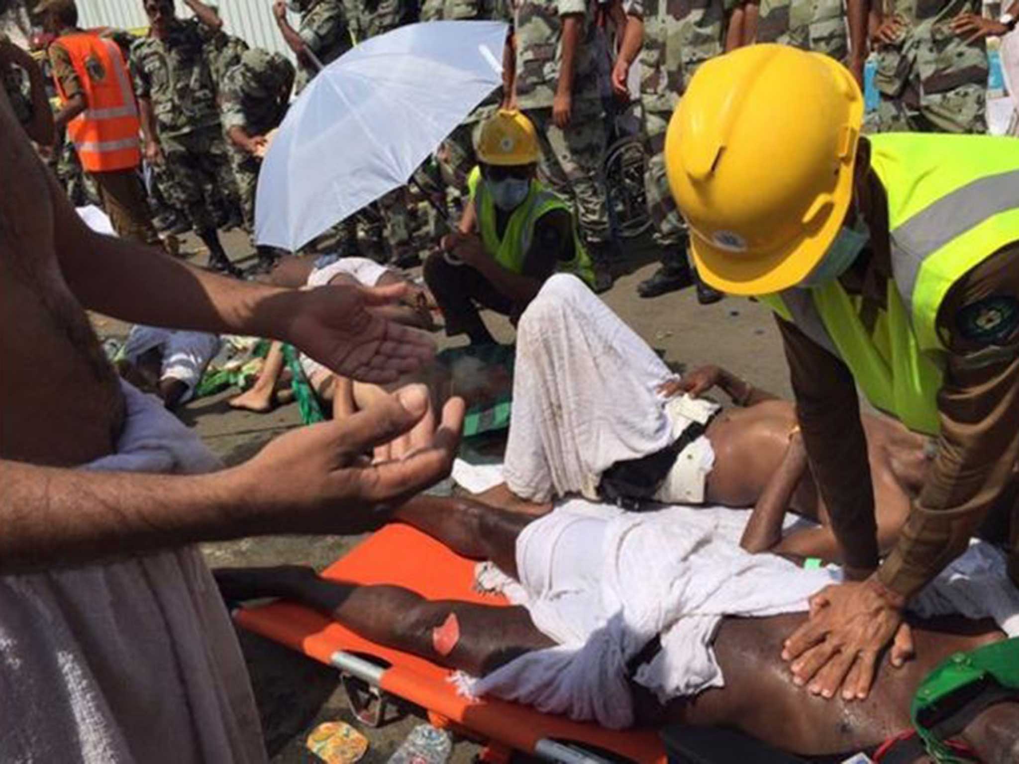 A medic tends to one of the more than 300 people injured in the stampede