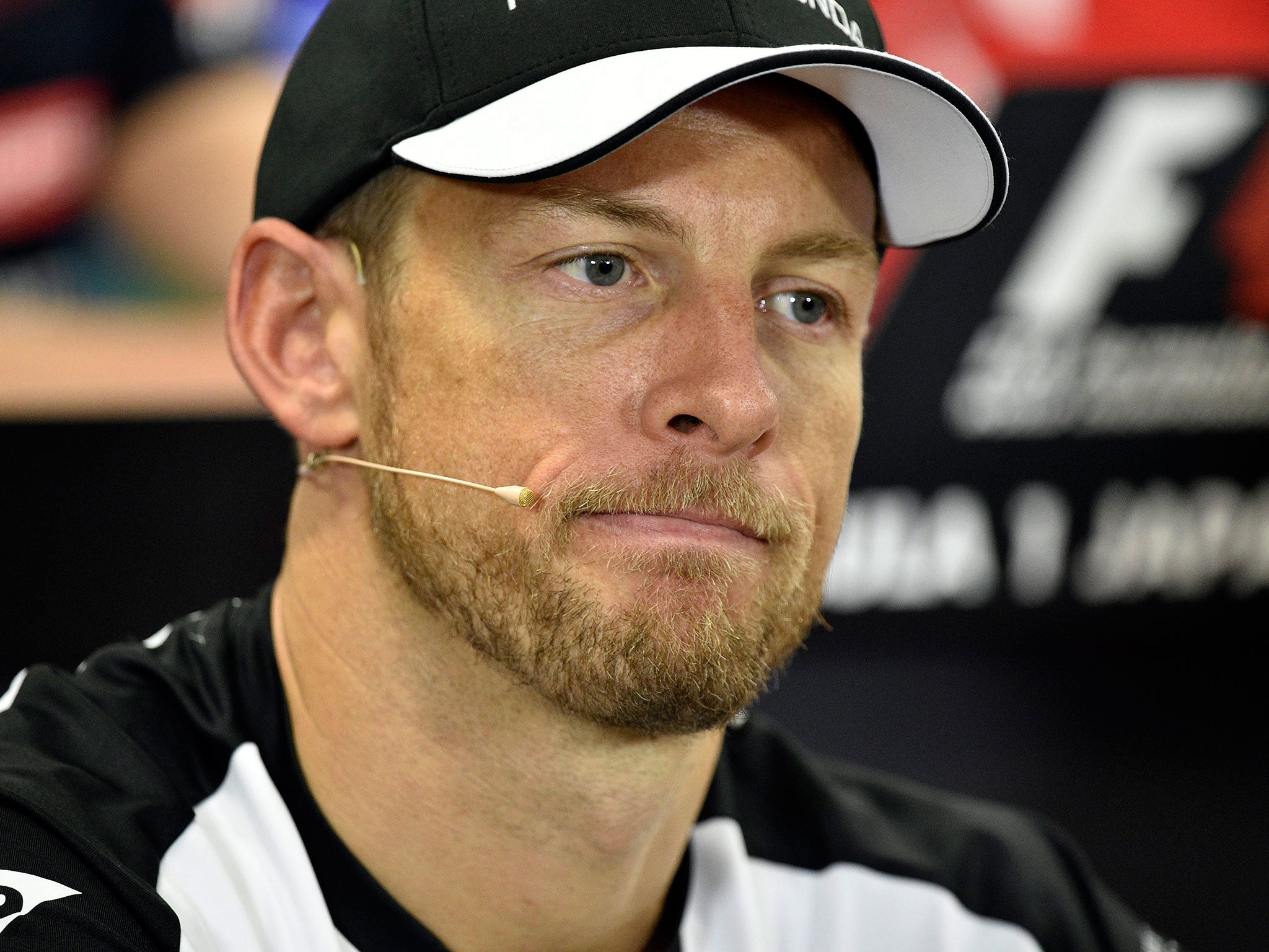 Jenson Button admitted he was not ‘joyful’ after dropping out of the race in Singapore