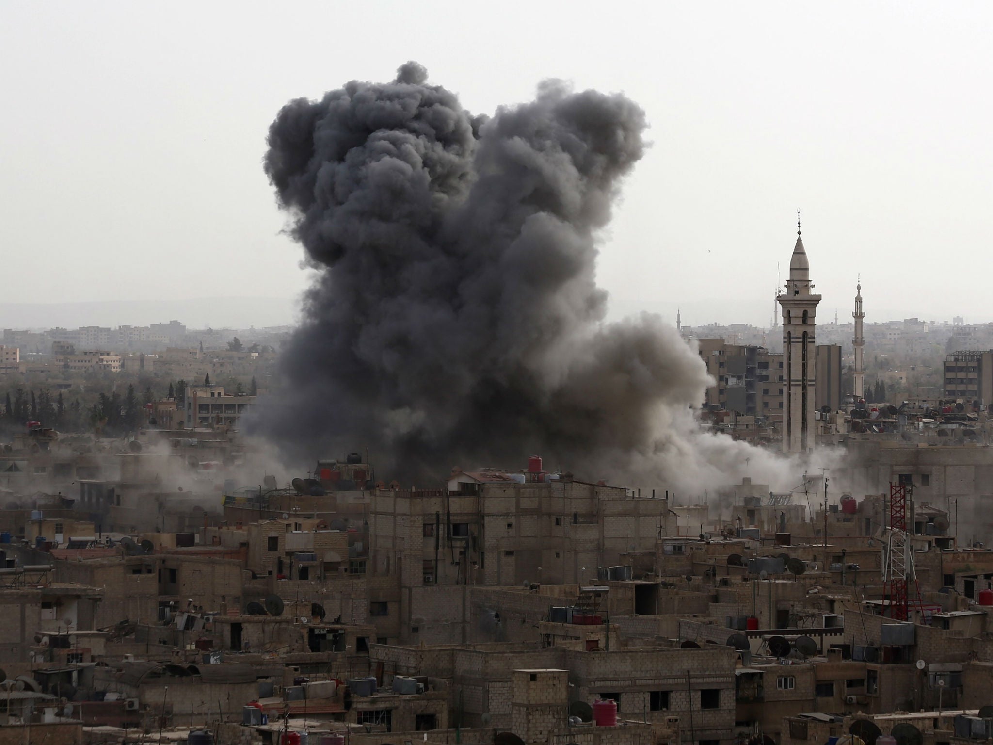 Smoke billows in the rebel-held area of Douma, east of Damascus, after a reported regime air strike