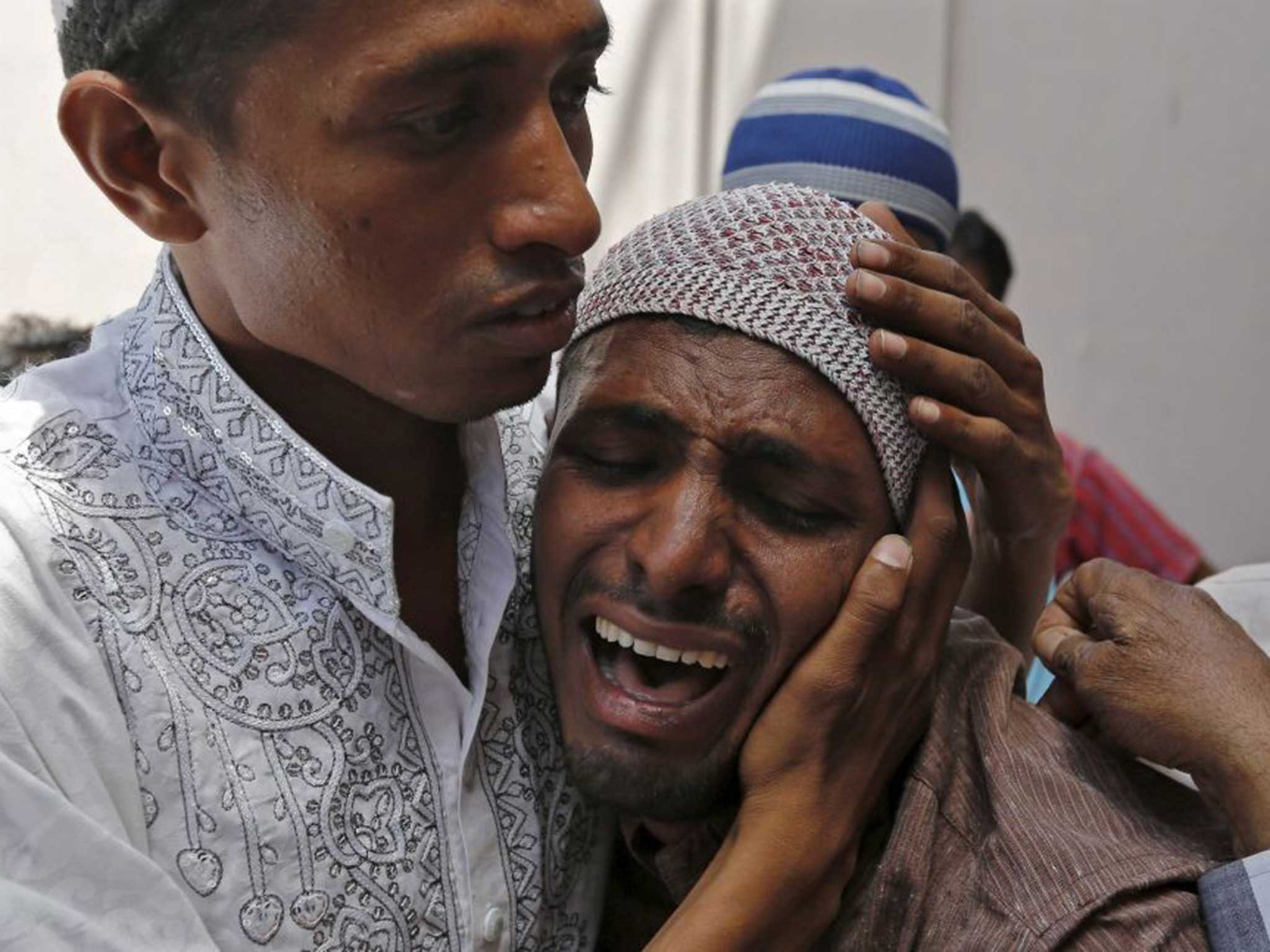 A man weeps after getting the news of his family members, killed in the stampede. Saudi authorities have been criticised for their handling of the tragedy