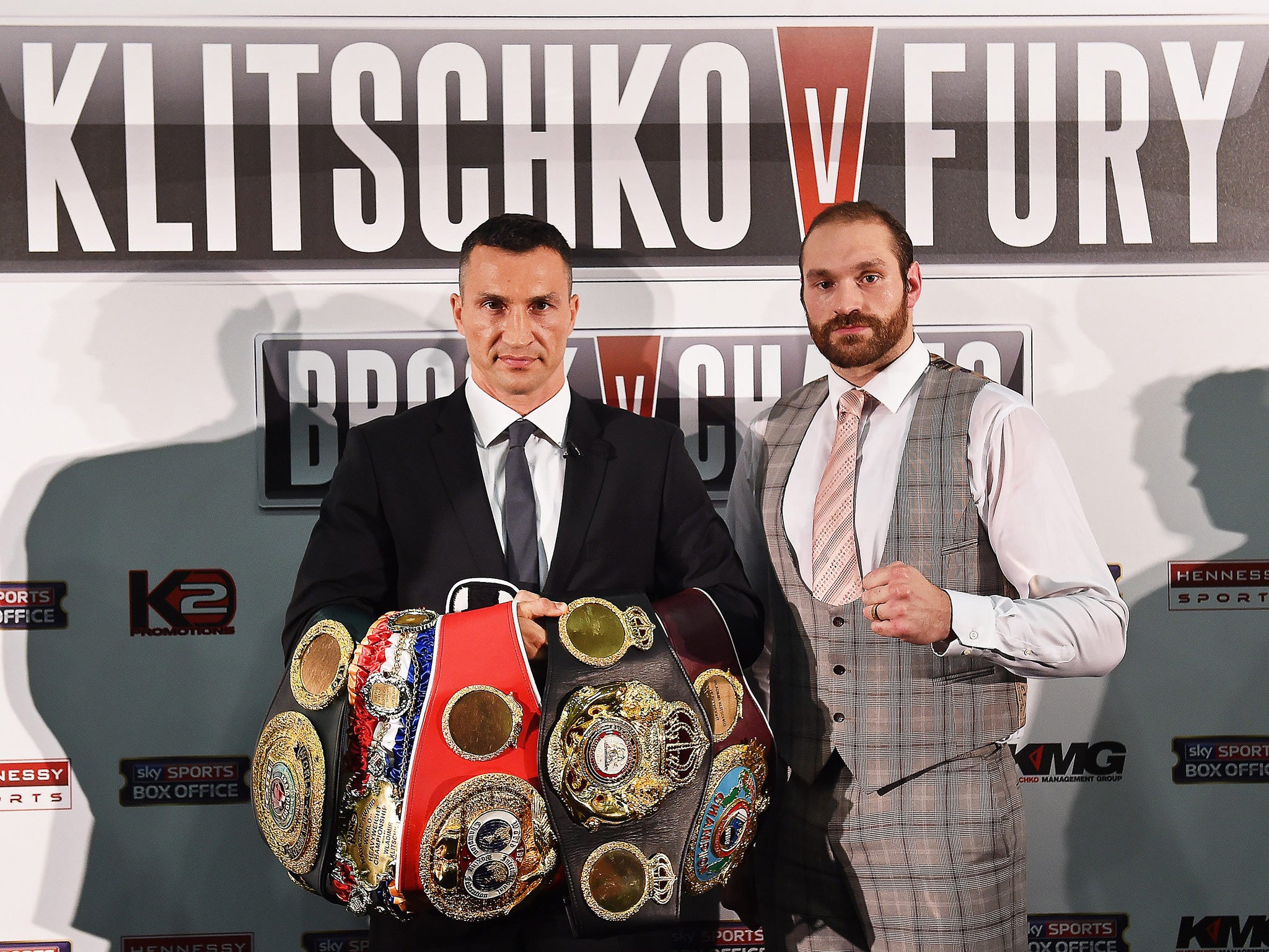 Wladimir Klitschko and Tyson Fury (right) pose during the build-up