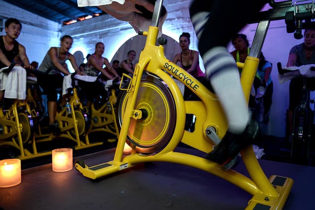 An instructor leads a SoulCycle class