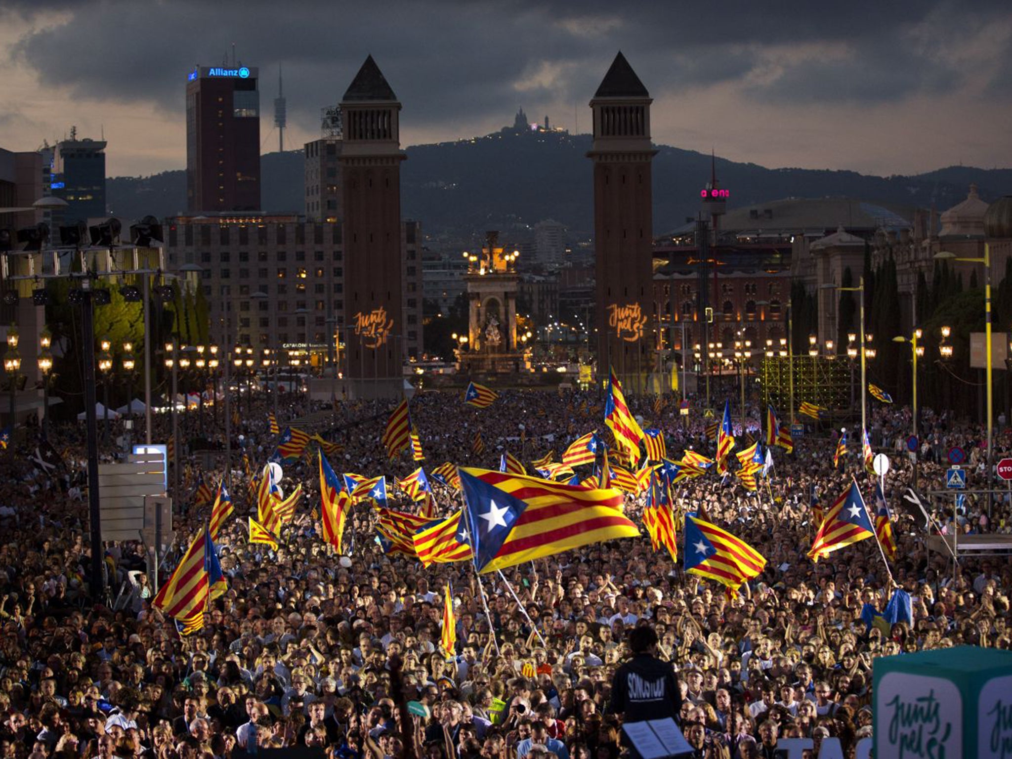 Viva Catalonia! Independence supporters at a rally in Barcelona on Friday