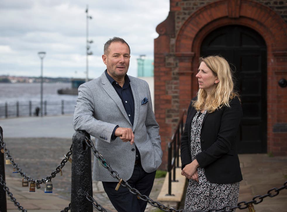 Former left-wing British politician, Derek Hatton, pictured in his home city of Liverpool talking to Independent journalist Jane Merrick.