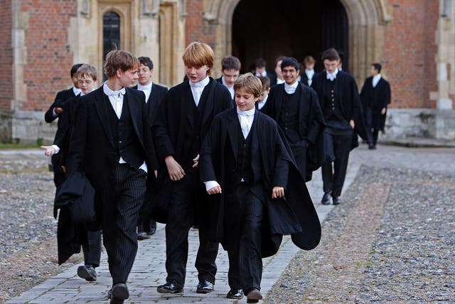 Boys make their way to classes across the historic cobbled School Yard of Eton College. File photo