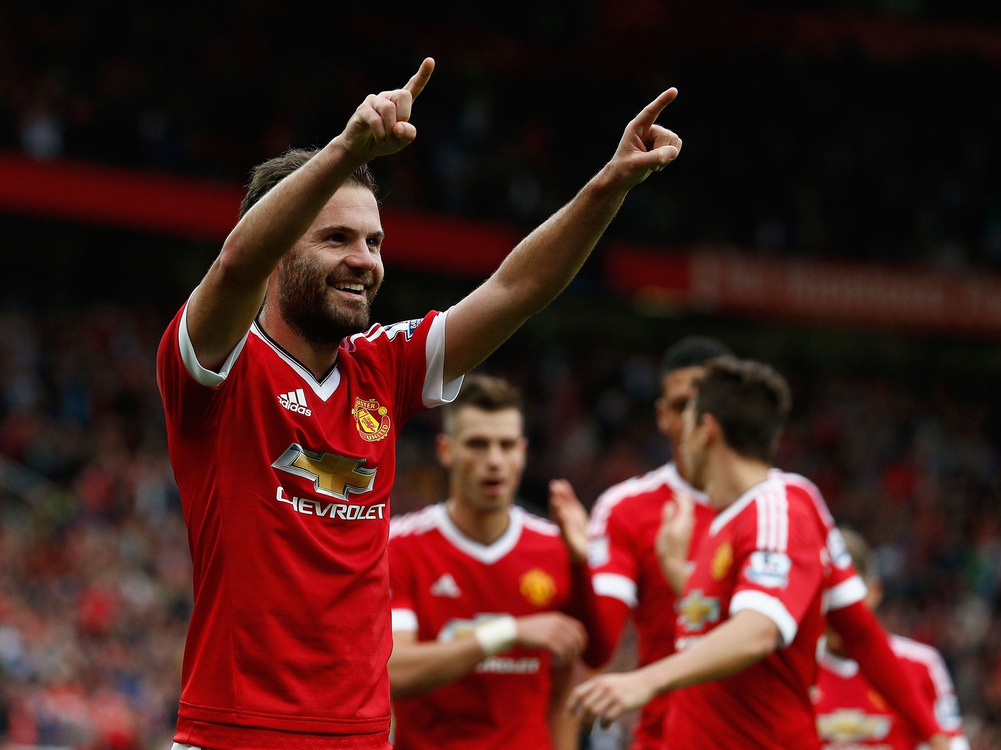 Juan Mata celebrates scoring for Manchester United