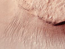 Mars's atmosphere was blown away by huge bursts of gas, scientists say