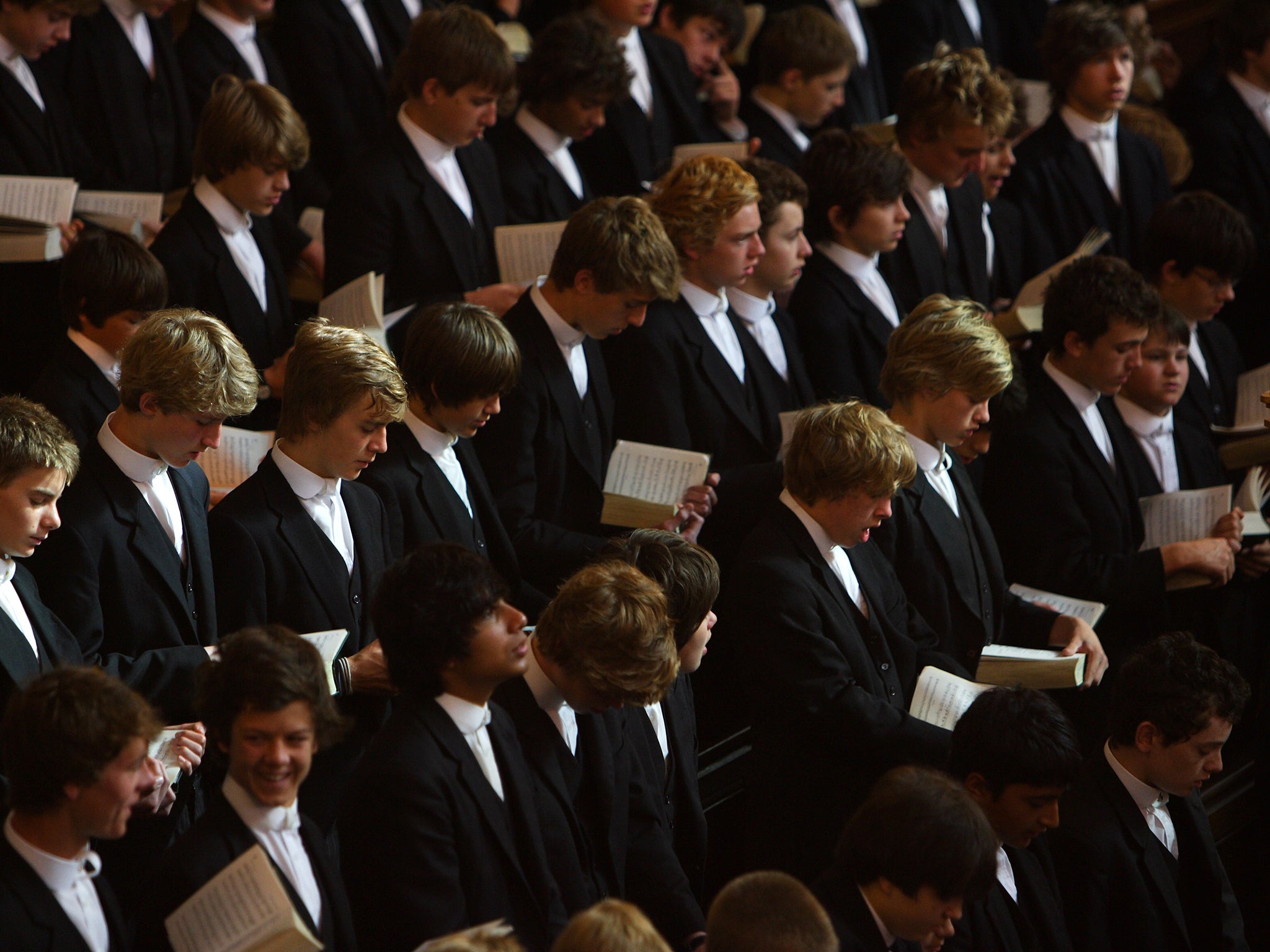 Pupils attending a chapel service at Eton College