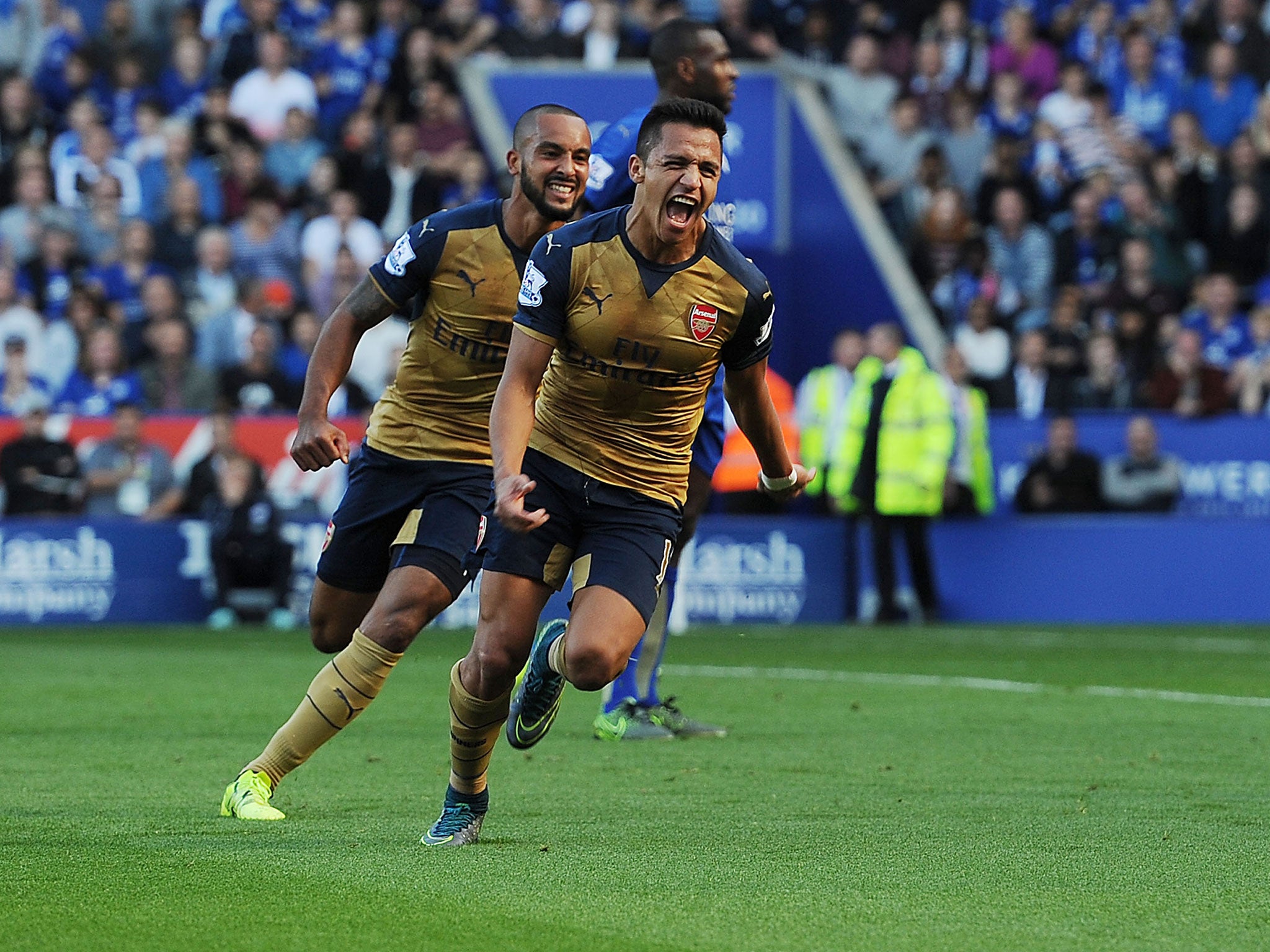 Alexis Sanchez celebrates scoring for Arsenal against Leicester