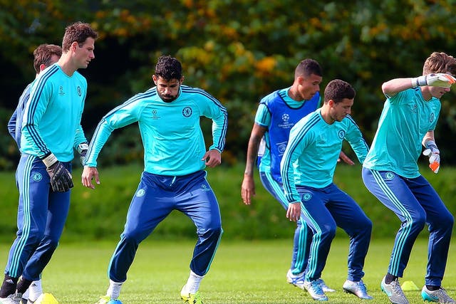 Diego Costa (second left) trains with the Chelsea squad at Cobham yesterday