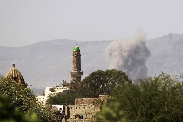 An air-strike by the Saudi-led coalition targeting an arms depot in the capital Sanaa on September 23, 2015. President Abedrabbo Mansour Hadi flew in to war-ravaged Yemen's second city of Aden after six months in exile in Saudi Arabia