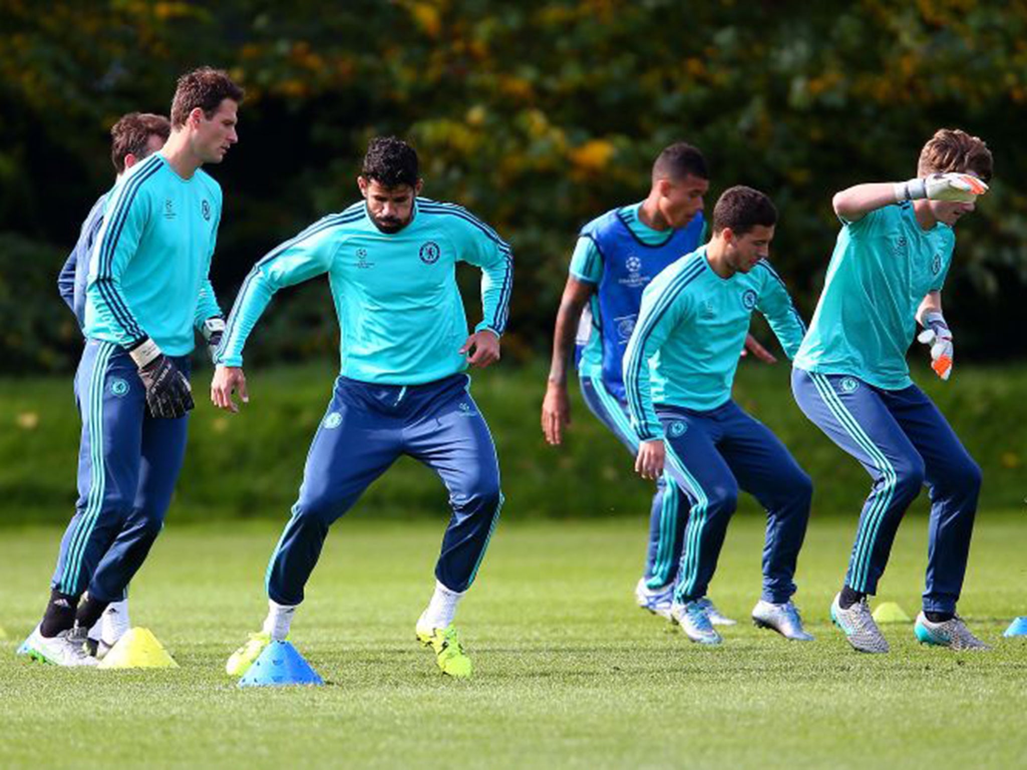 Mourinho's Chelsea squad is put through its paces at a training session on Monday