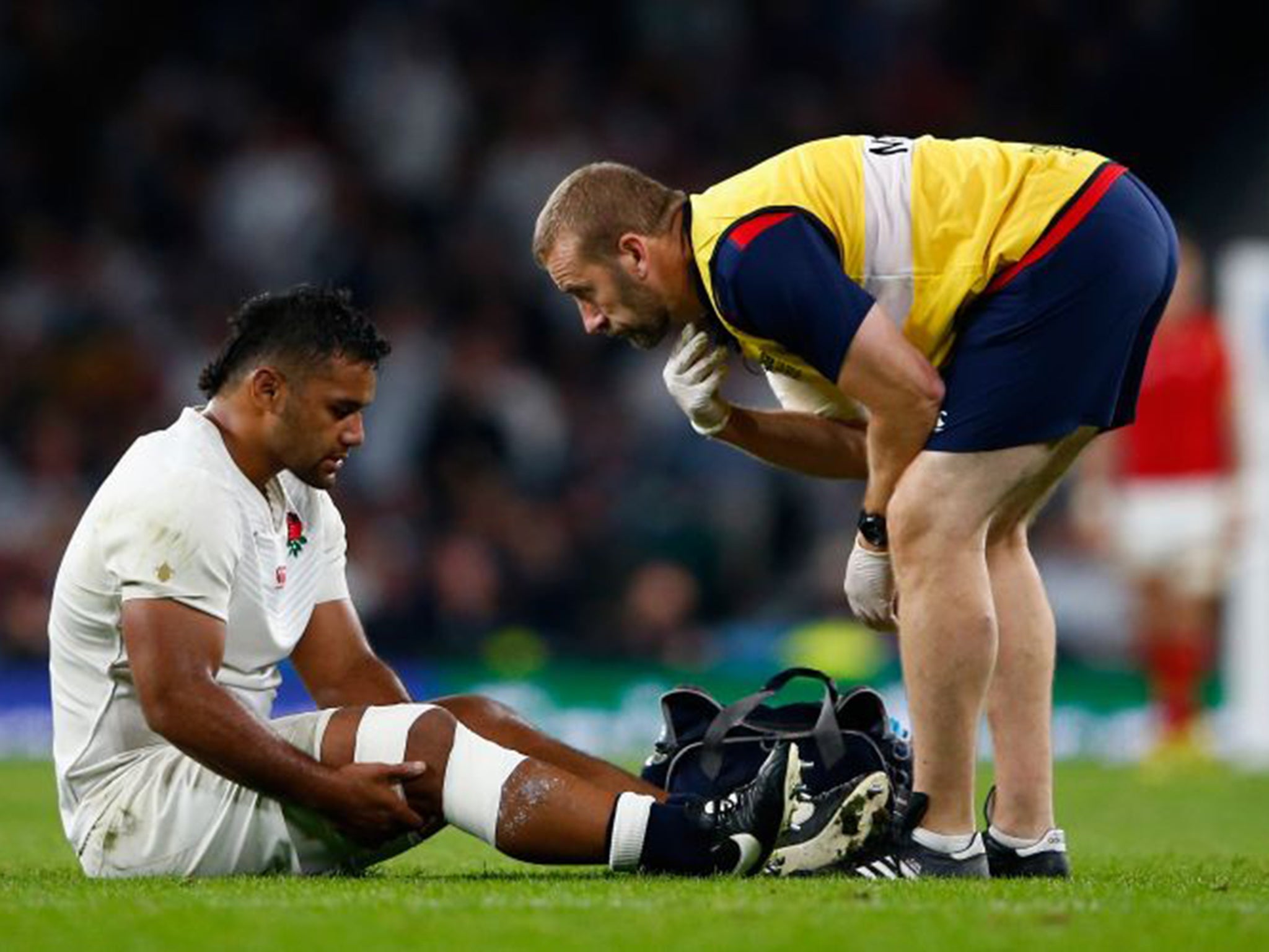 Billy Vunipola receives treatment on the knee injury he picked up during Saturday’s defeat to Wales, and which has now ruled him out of the World Cup