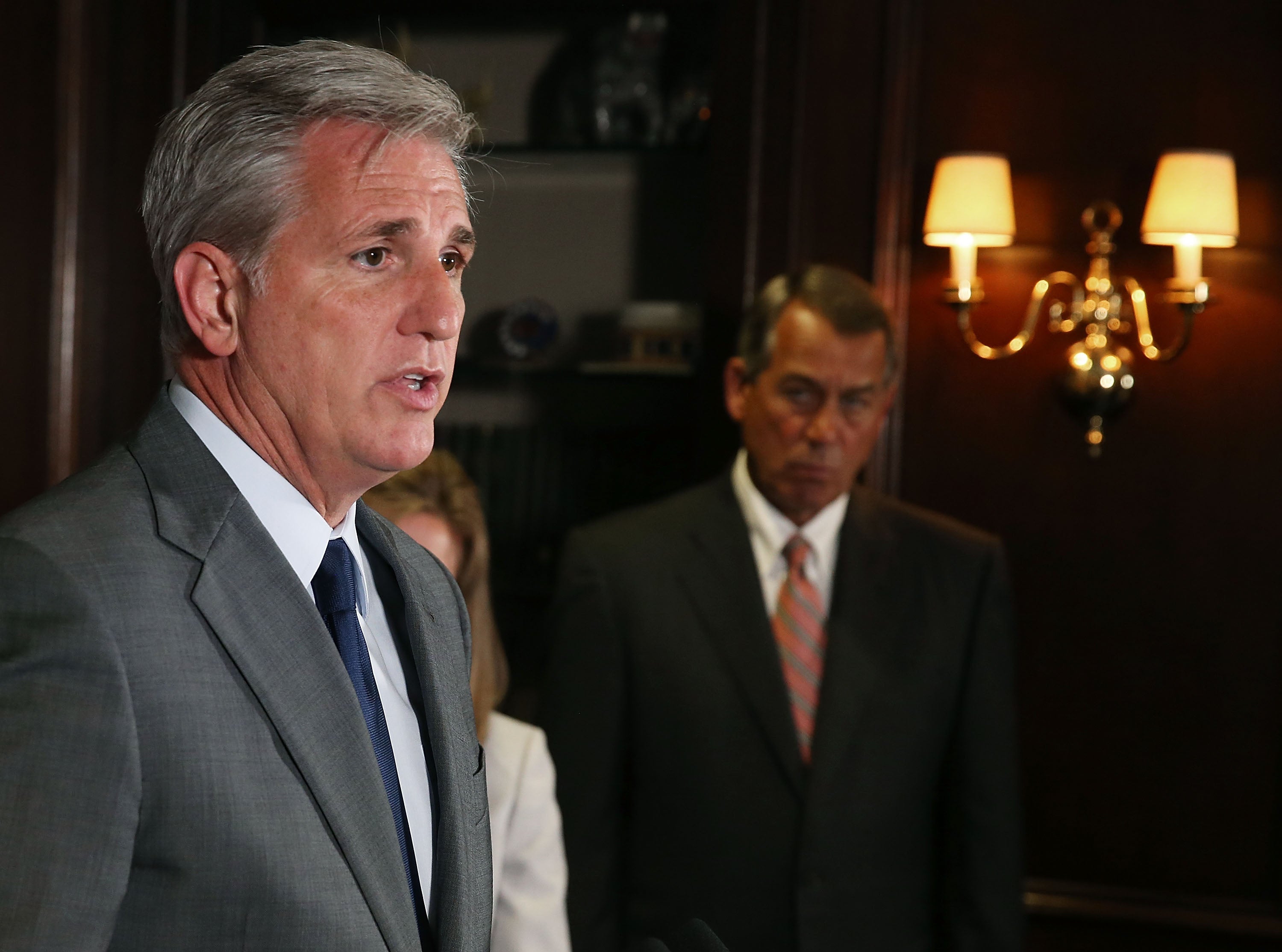 Kevin McCarthy speaks while flanked by John Boehner (R-OH) during a press conference in Washington DC.