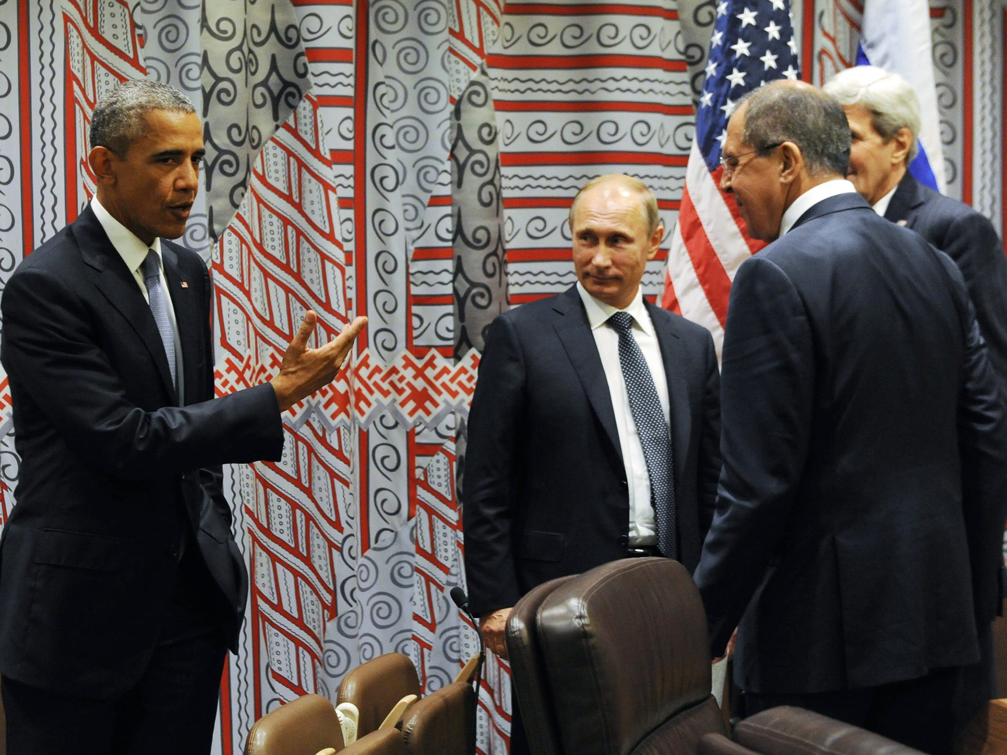 US President Barack Obama, Russian President Valdimir Putin, Russian Foreign Minister Sergei Lavrov and US Secretary of State John Kerry talk to each other after negotiations of Russian and US leaders at the United Nations headquarters in New York City