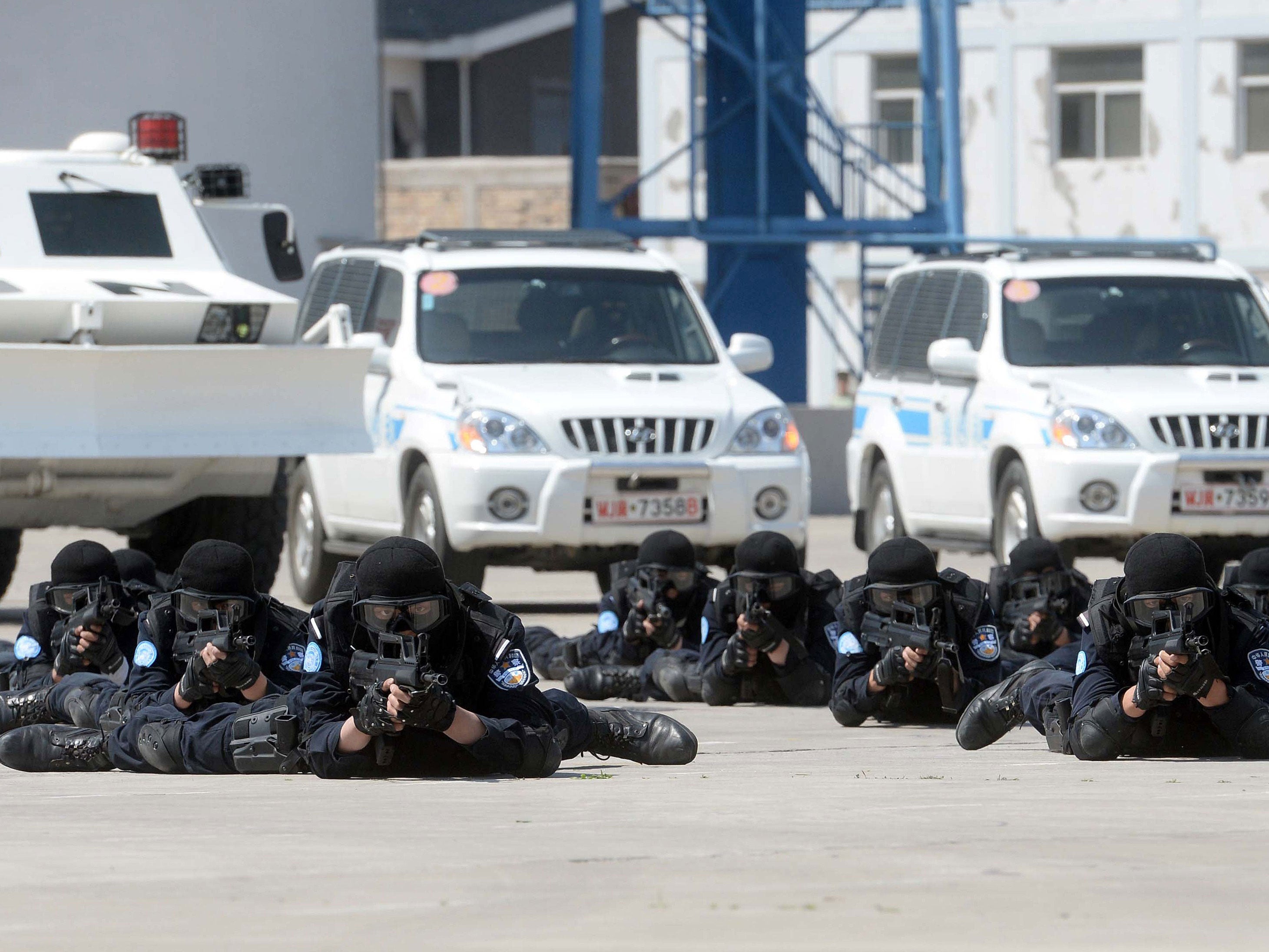 Chinese peacekeeping police taking part in drills before they leave for a United Nations peacekeeping mission in Liberia