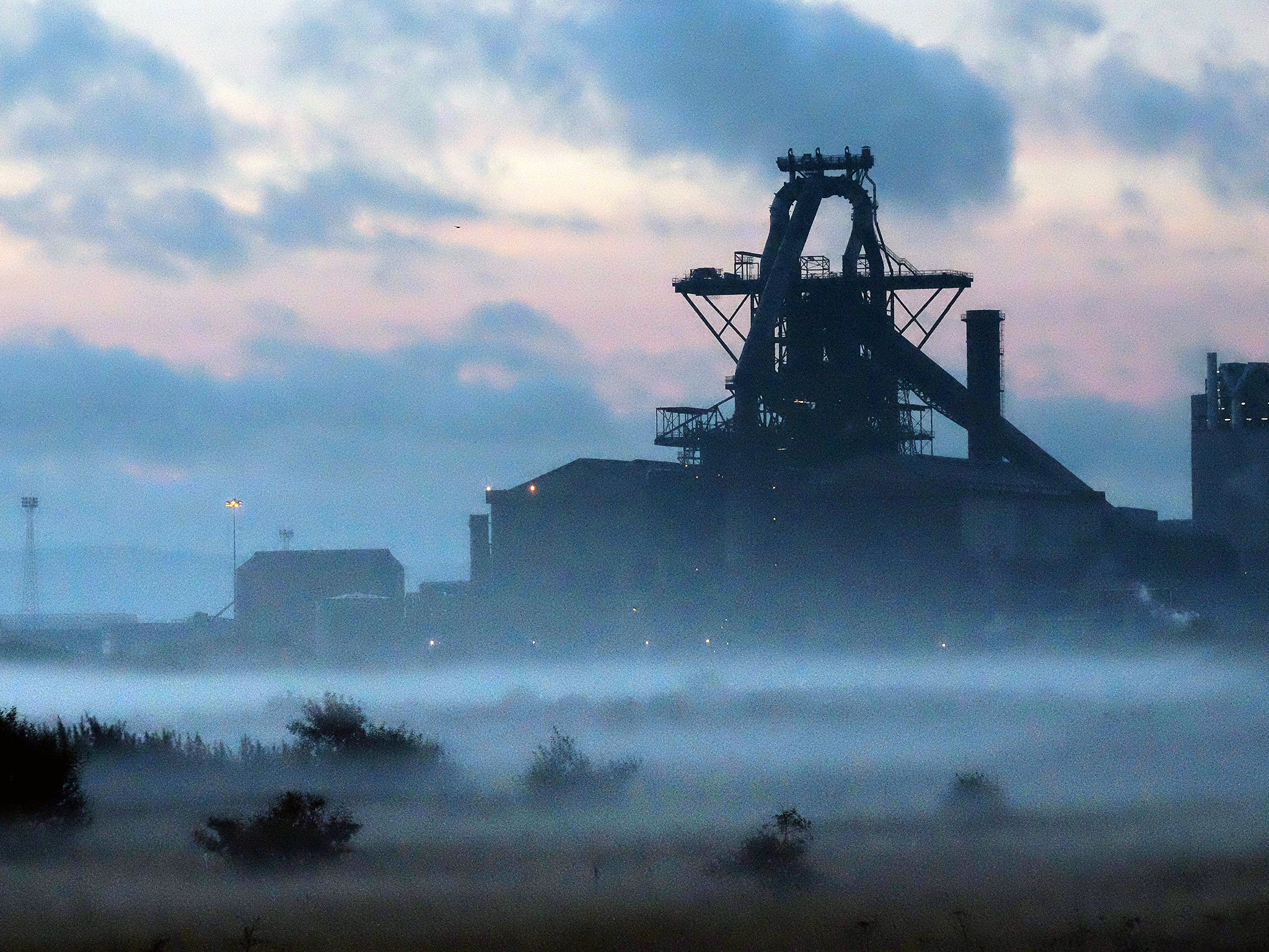 Dawn breaks over the blast furnace at the SSI UK steel plant in Redcar. Following the announcement that SSI UK are mothballing the plant and ceasing steel production 1700 jobs at the Teesside site have been lost