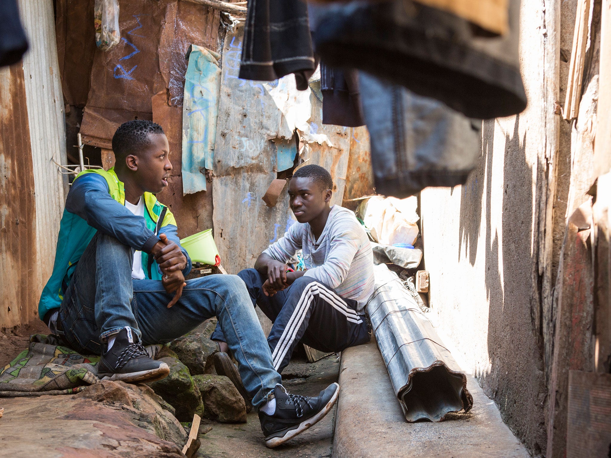 Jamal Edwards visits Peter, 16, who dances with the JABE Dance School in Kibera