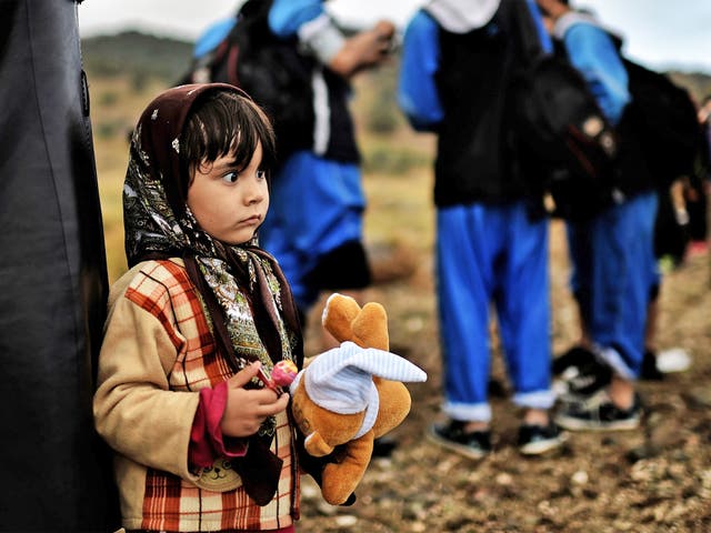 A young refugee on the Greek island of Lesbos after crossing the Aegean sea from Turkey, on Tuesday