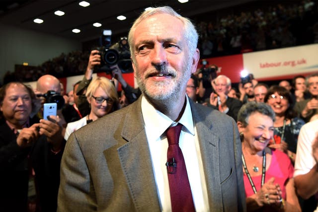 Jeremy Corbyn greets delegates after delivering his keynote speech during the Labour Conference in Brighton