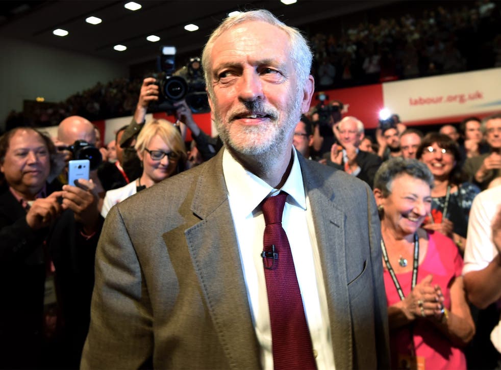 Jeremy Corbyn greets delegates after delivering his keynote speech during the Labour Conference in Brighton