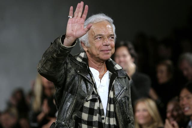 Ralph Lauren waves at the conclusion of his Fall 2008 women's fashion show during Fashion Week in New York