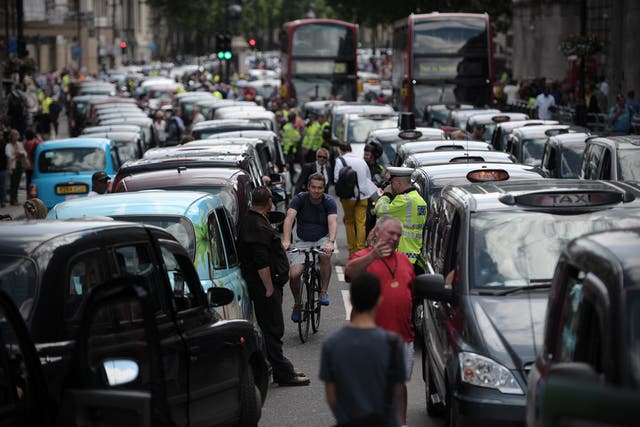 Cab drivers cause gridlock in central London during a 2014 anti-Uber protest
