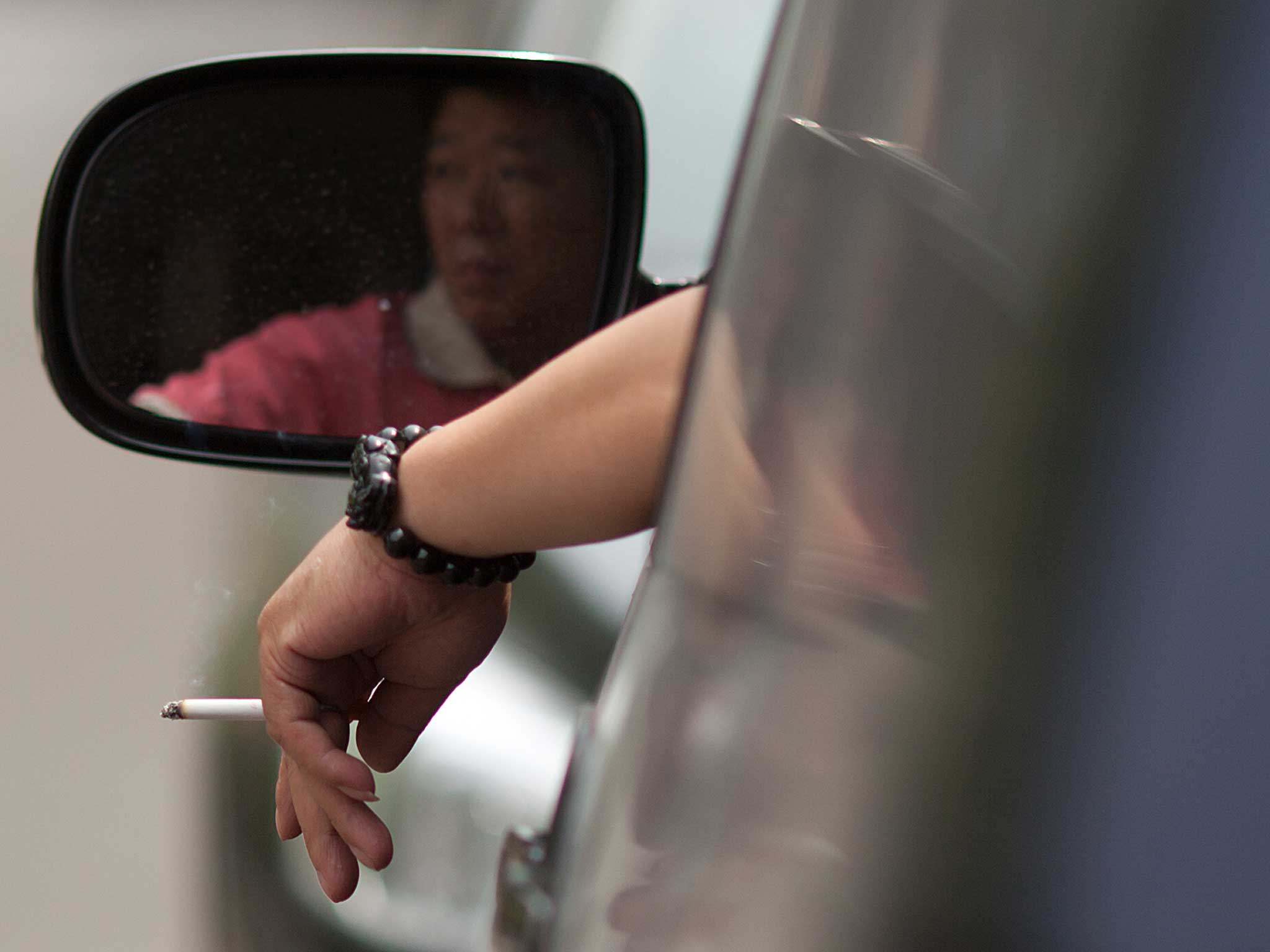 Motorists could be fined £50 if they are found smoking in a car when a child is present