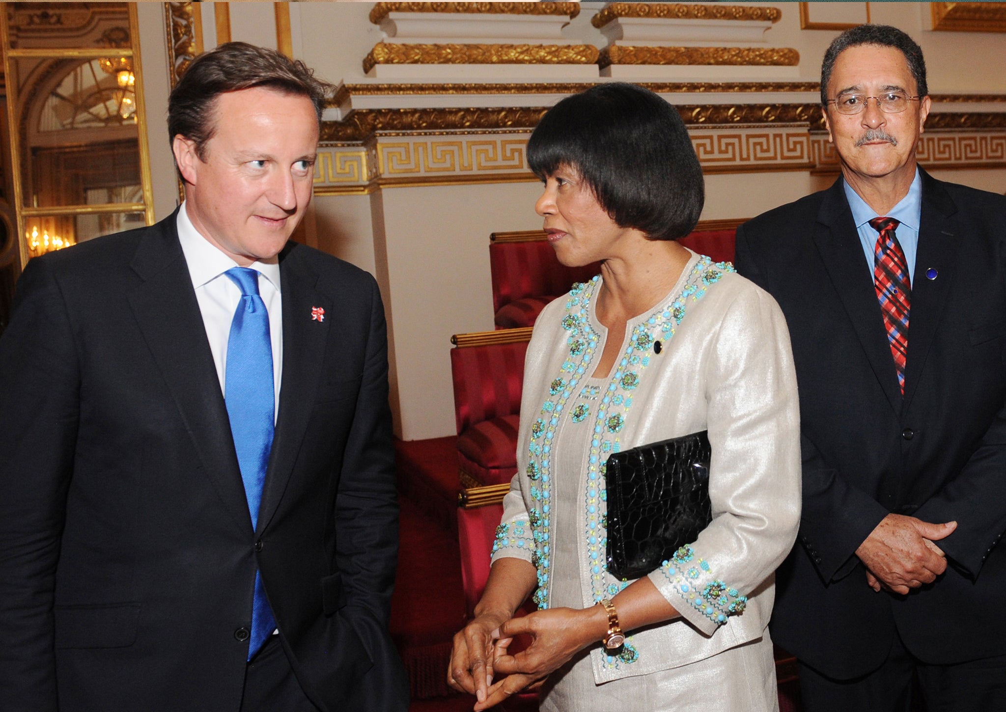 David Cameron meets Prime Minister of Jamaica Portia Simpson Miller and St Lucia's Prime Minister Kenny Anthony during a reception at Buckingham Palace
