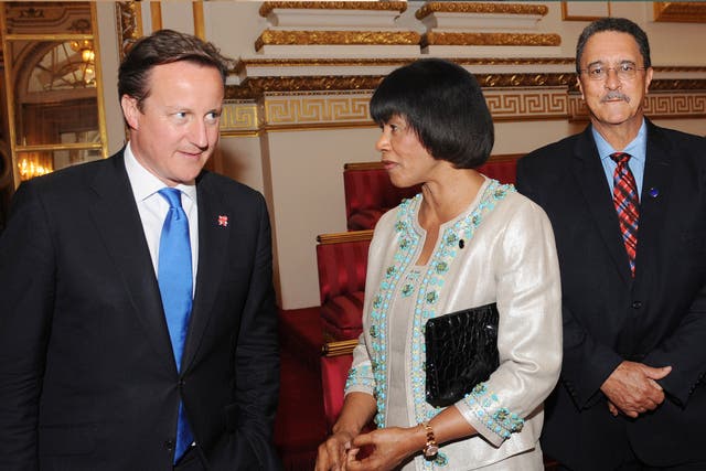 David Cameron meets Prime Minister of Jamaica Portia Simpson Miller and St Lucia's Prime Minister Kenny Anthony during a reception at Buckingham Palace