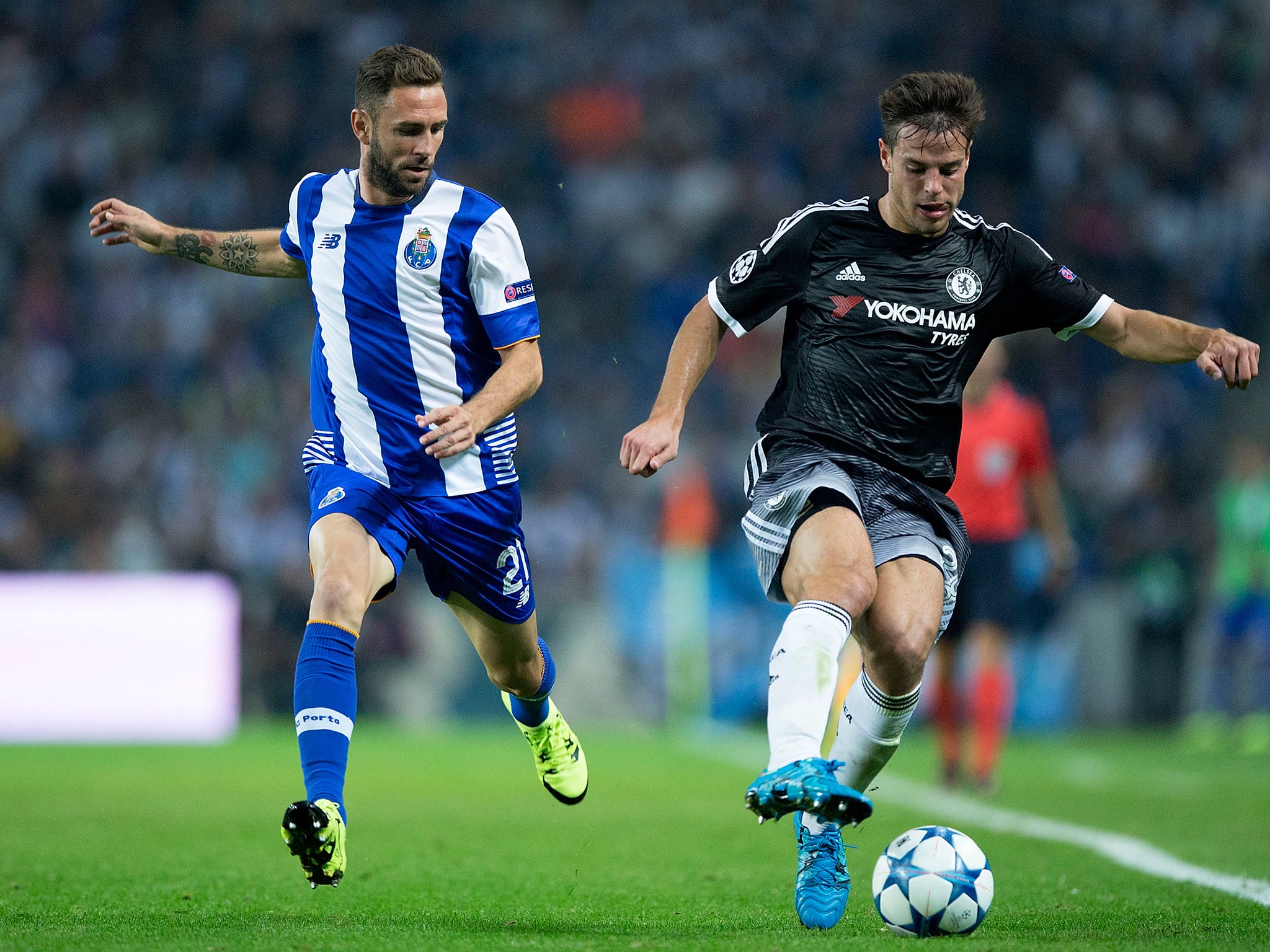 Miguel Layun competes with Cesar Azpilicueta for the ball last night