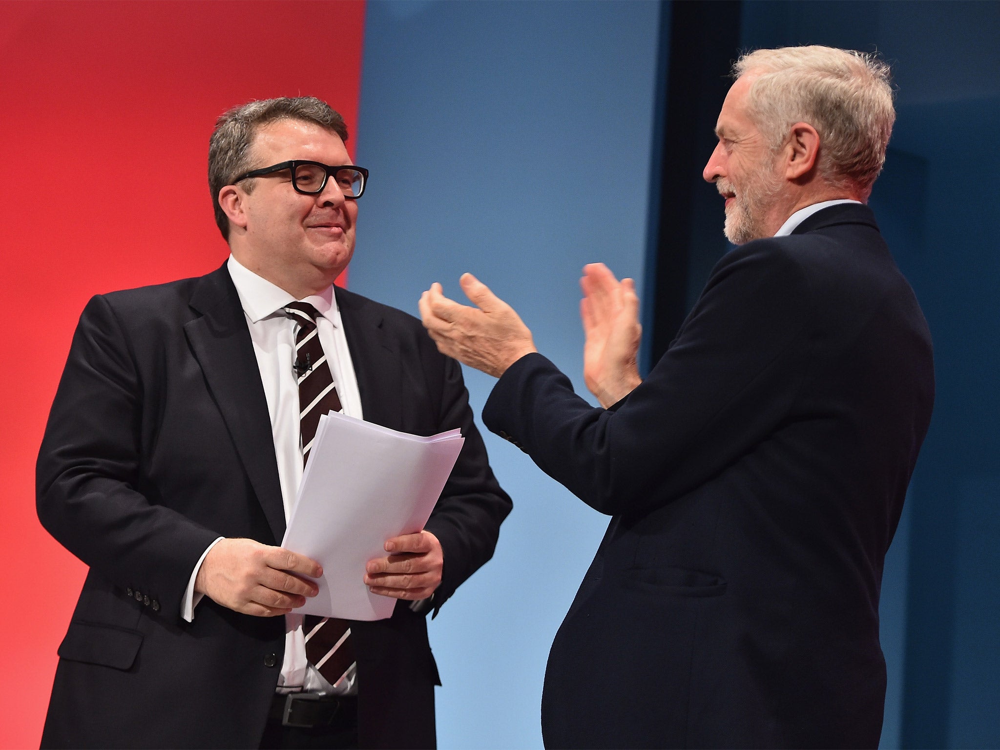 Deputy Leader of the Labour party Tom Watson recieves applause from Jeremy Corbyn following his closing speech