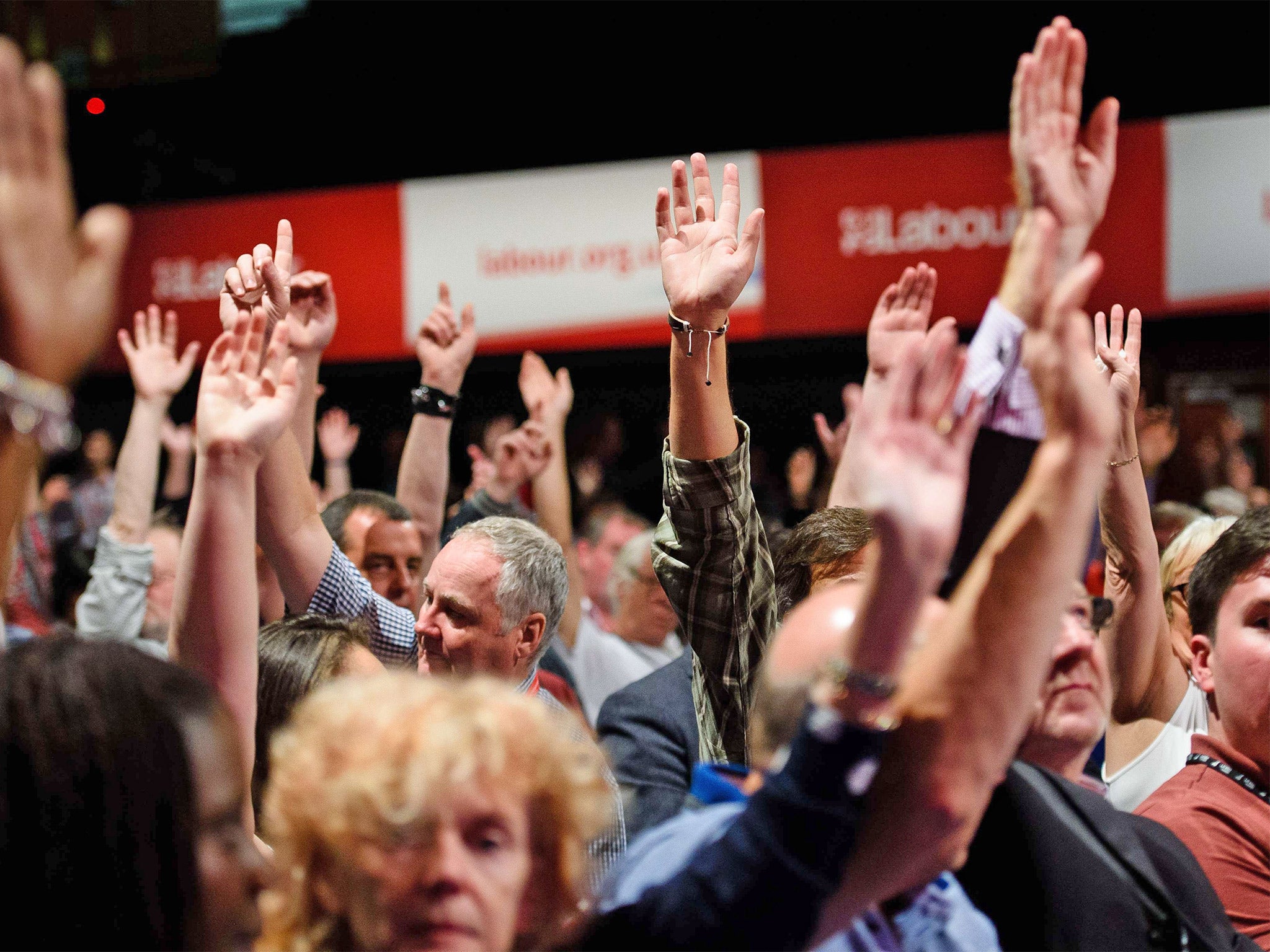 Labour delegates take part in a vote on the conditions for supporting British military action in Syria (Getty)
