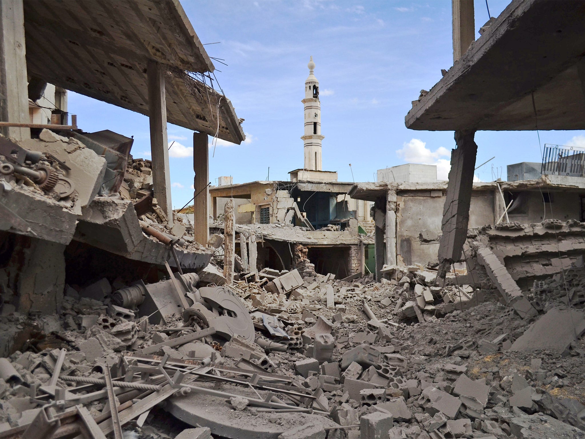 Damaged buildings the Syrian town of Talbiseh, Homs, following Wednesday's strikes