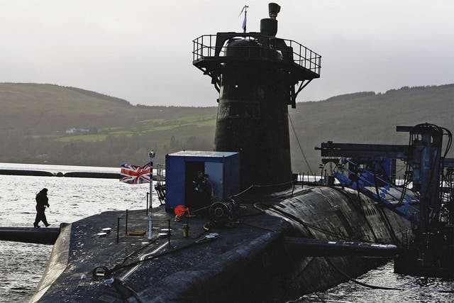 HMS Vanguard sits in dock on Gare Loch, Scotland, where Britain’s nuclear missile fleet is based