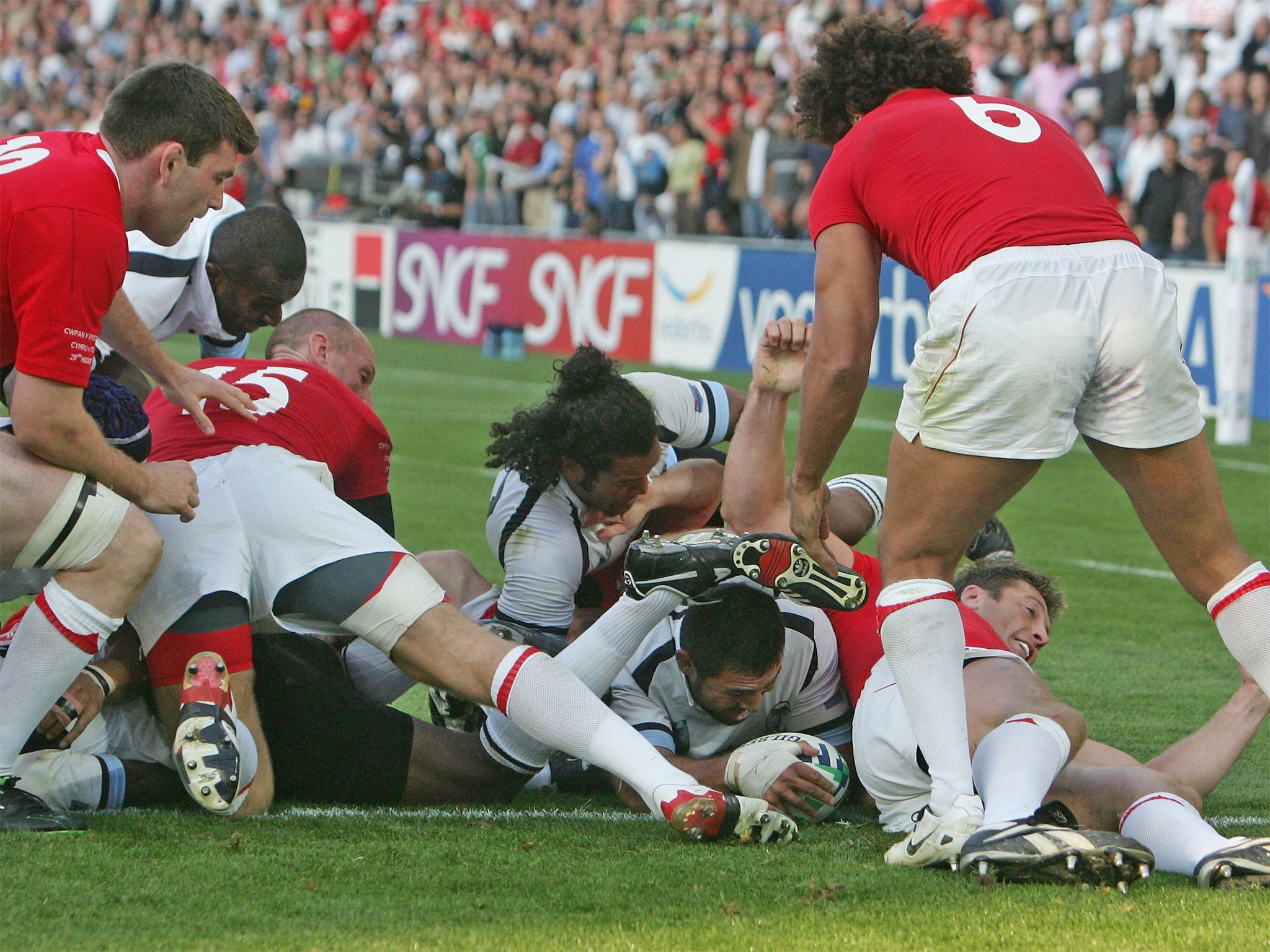 Fiji prop Graham Dewes bustles over for the match-winning try against Wales with four minutes left in Nantes in 2007 after the Welsh had come back from a 25-3 deficit to take the lead