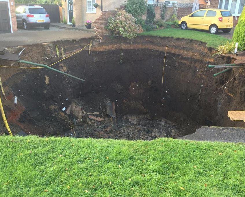 The sinkhole appeared on a residential street overnight