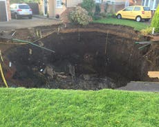 Giant sinkhole opens up on residential street in St Albans