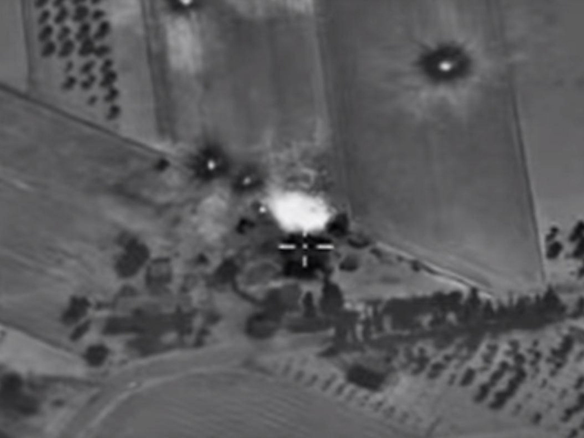 The video claimed to show four air strikes on Isis positions overnight on 1 October
