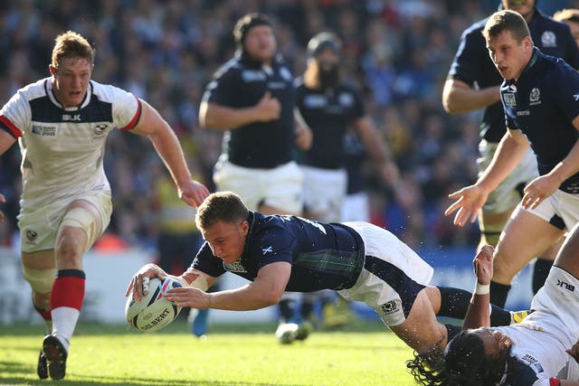 Duncan Weir scores a try for Scotland against the USA