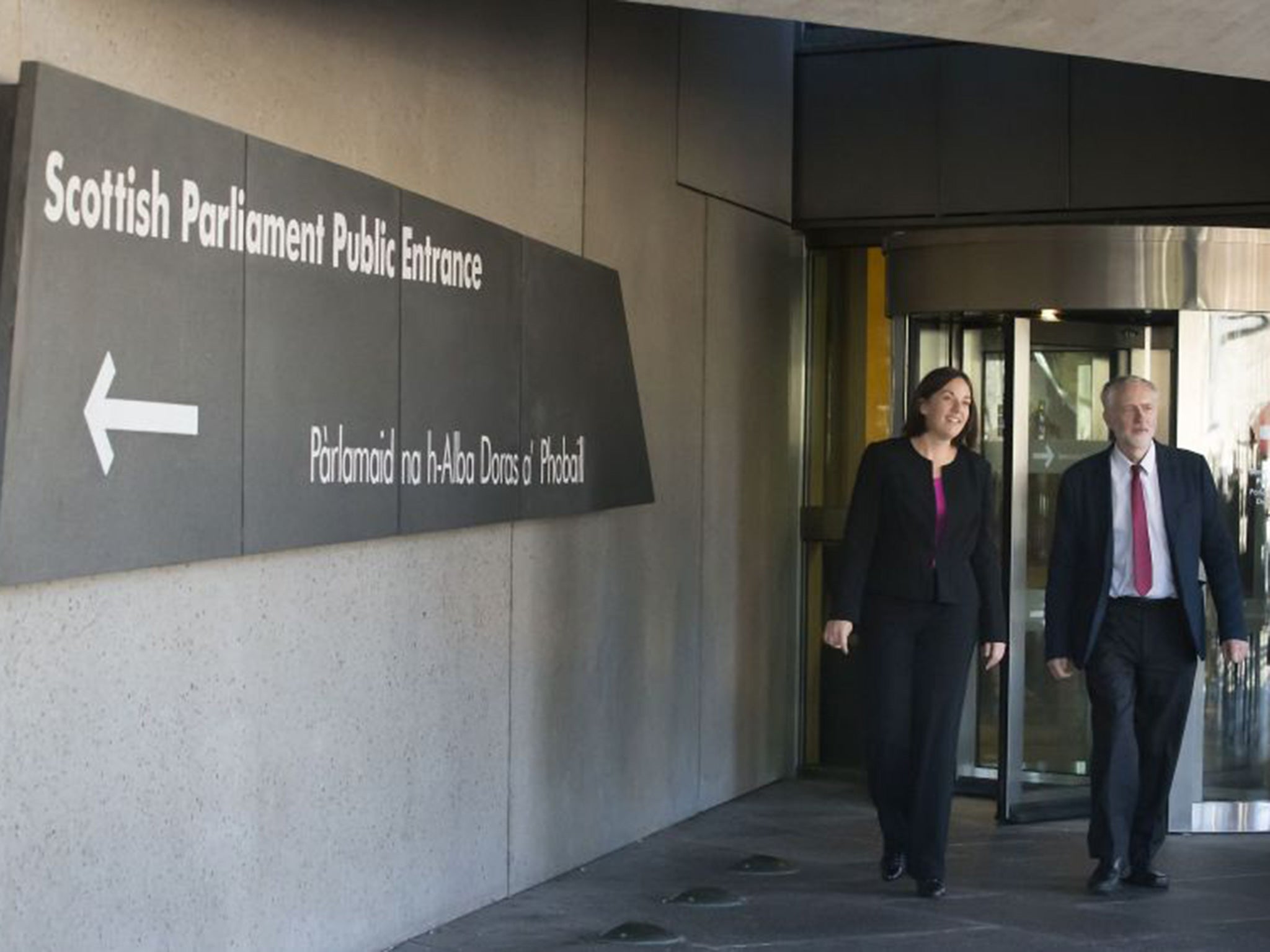 Jeremy Corbyn and Scottish Labour leader Kezia Dugdale leave the Scottish Parliament building in Edinburgh