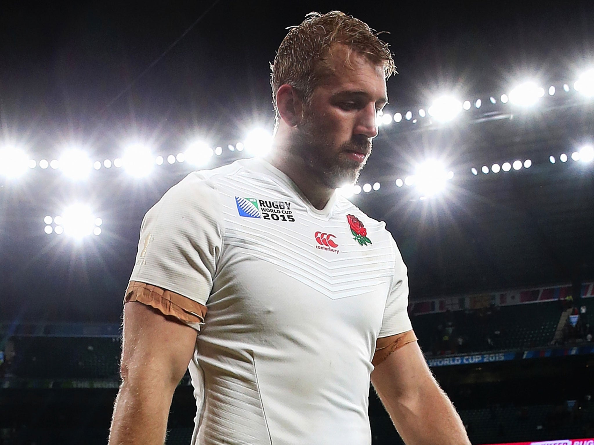 A dejected Chris Robshaw walks off the Twickenham pitch after the defeat to Wales