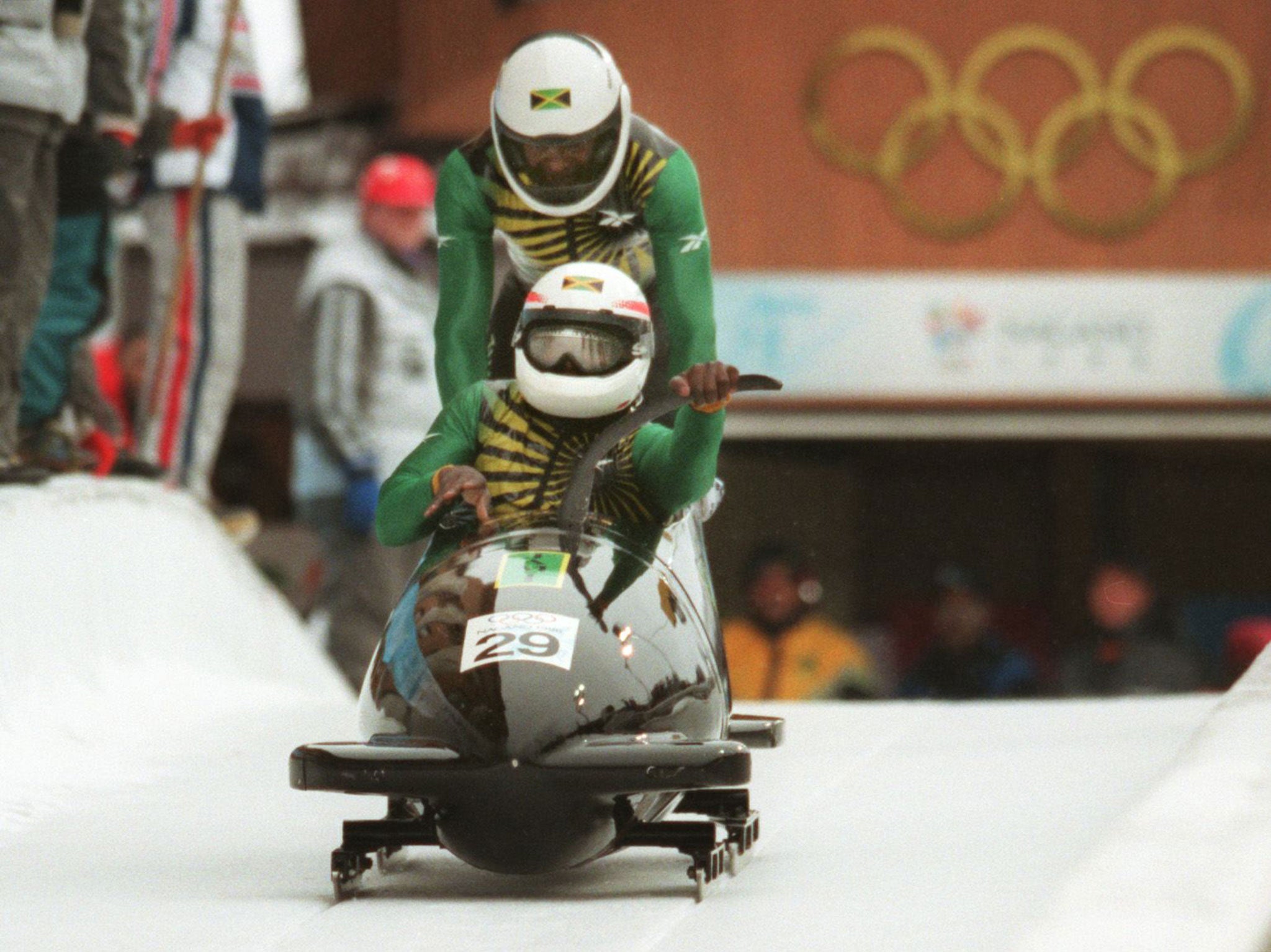 Devon Harris (front) and Michael Morgan (rear), of Jamaica take part in the two-man bobsleigh event