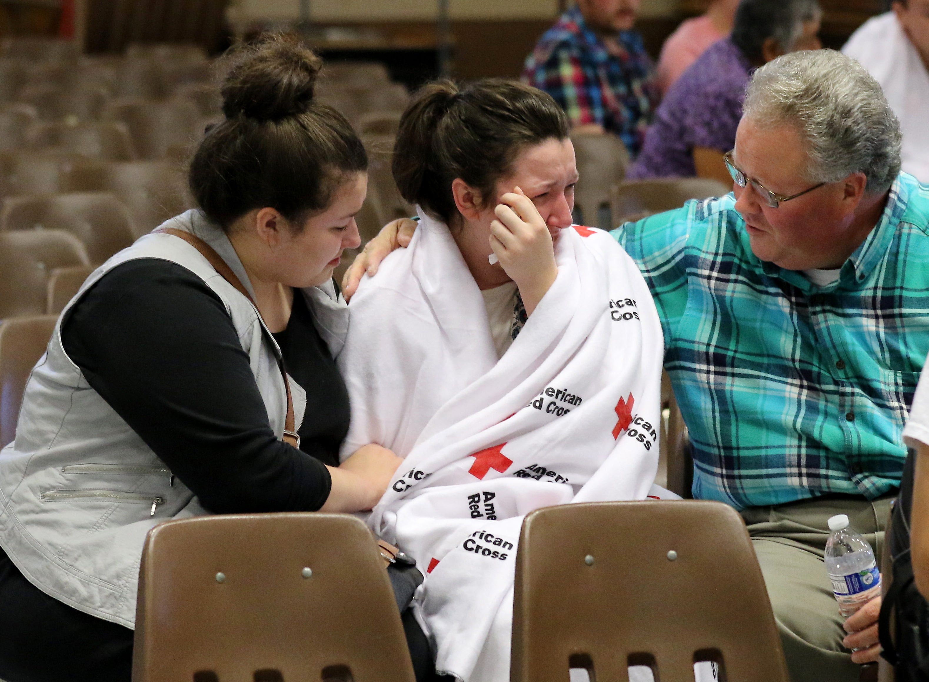 Hannah Miles, is reunited with her sister Hailey and father Gary after a shooting at Umpqua Community College.